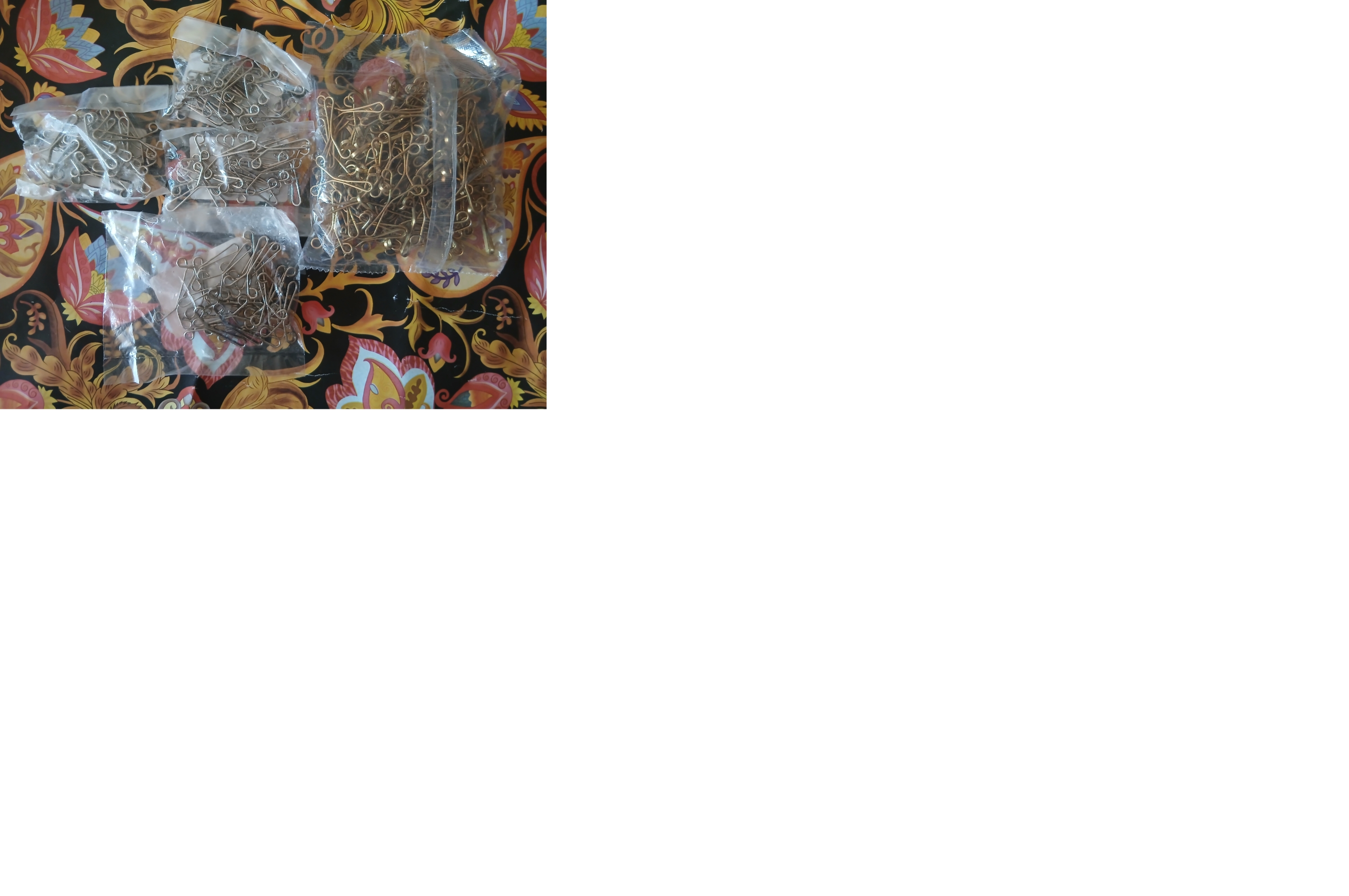 گیره روسری سرپیچ پیچ طلایی و نقره ای و دودی .فروش  سه رنگ مختلف.